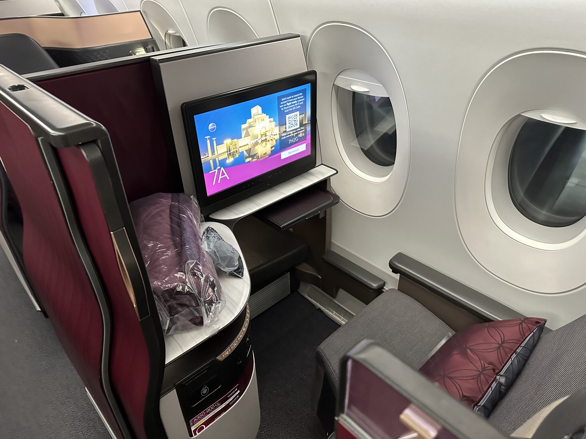 a tv on a table in an airplane