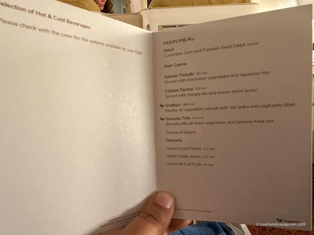 a person holding a menu
