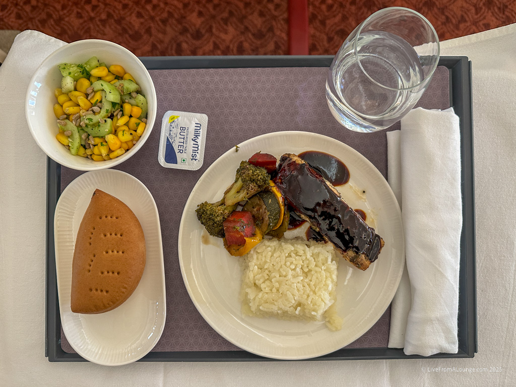 a plate of food on a tray