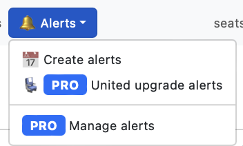 The image shows a dropdown menu under a blue "Alerts" button with a bell icon. The menu has three options: "Create alerts" with a calendar icon, "United upgrade alerts" with a computer icon and a "PRO" label, and "Manage alerts" with a "PRO" label.
