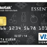 a black credit card with white text and images on it