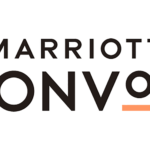 a black and orange logo
