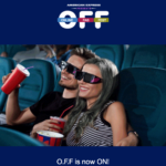 a man and woman in 3d glasses sitting in a movie theater