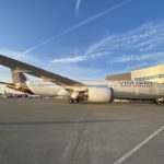 a large white airplane on a tarmac