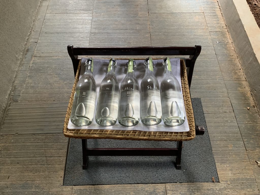 a group of empty bottles on a table