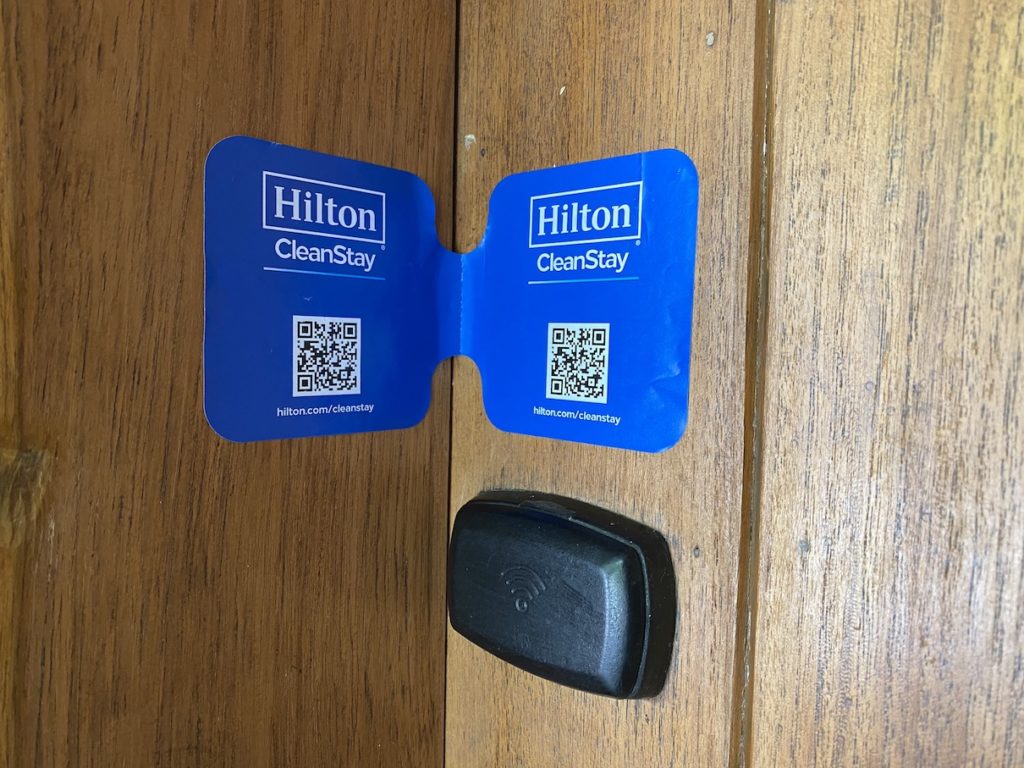 a blue card with a qr code on it
