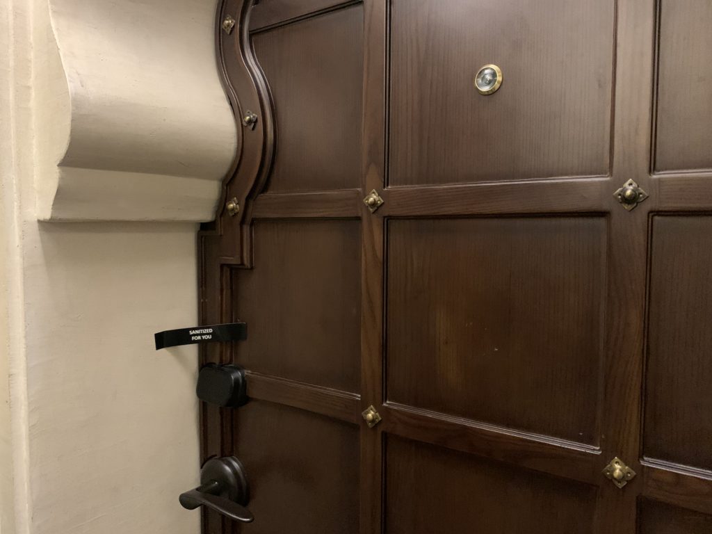 a door with a handle and a door knob