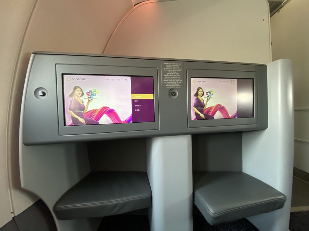 a two screens on a seat