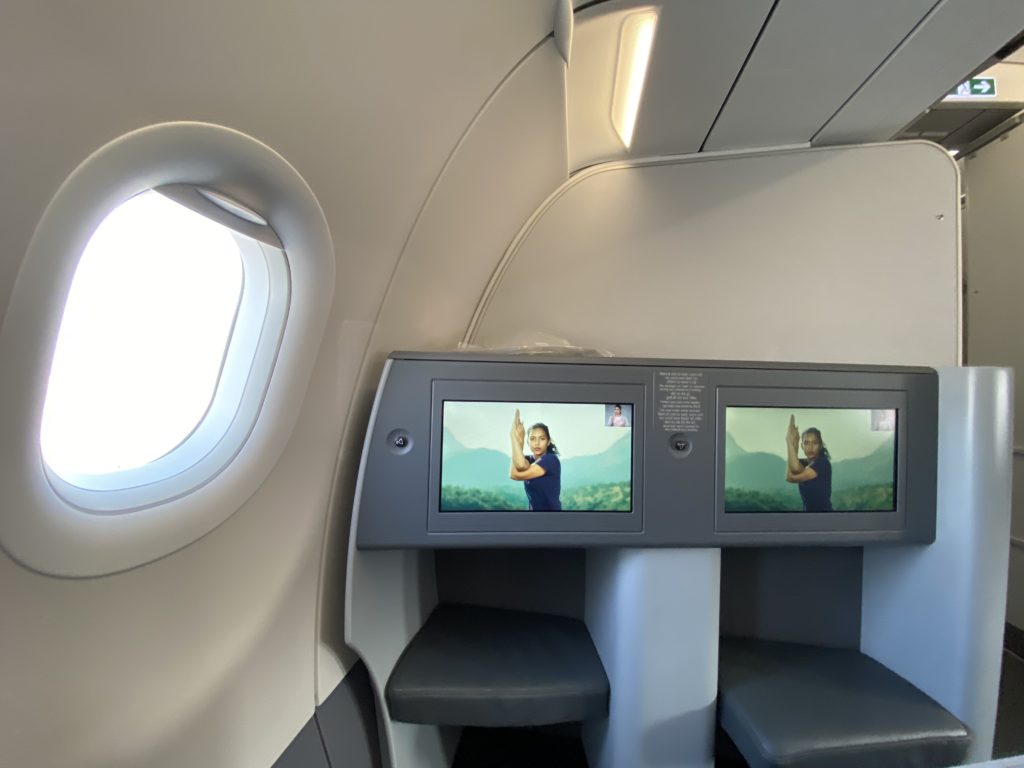 a screen on the side of a plane