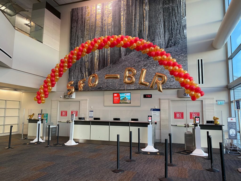 a balloon arch in a lobby