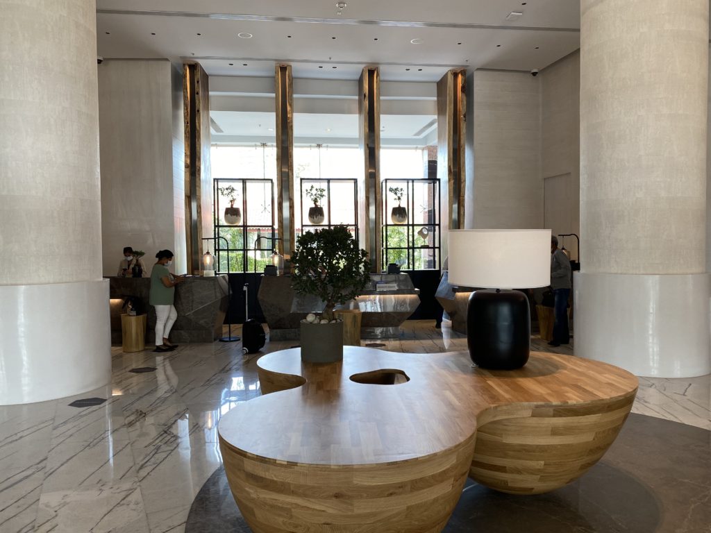 a large wooden table in a lobby