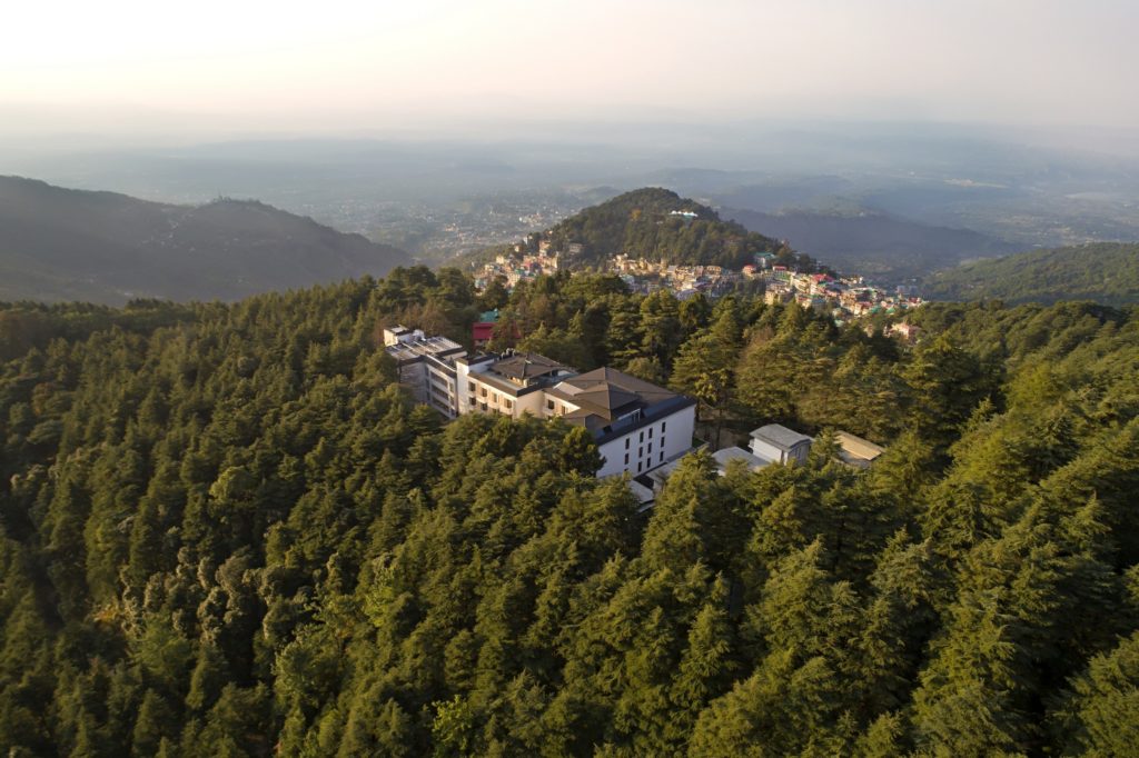 a building surrounded by trees