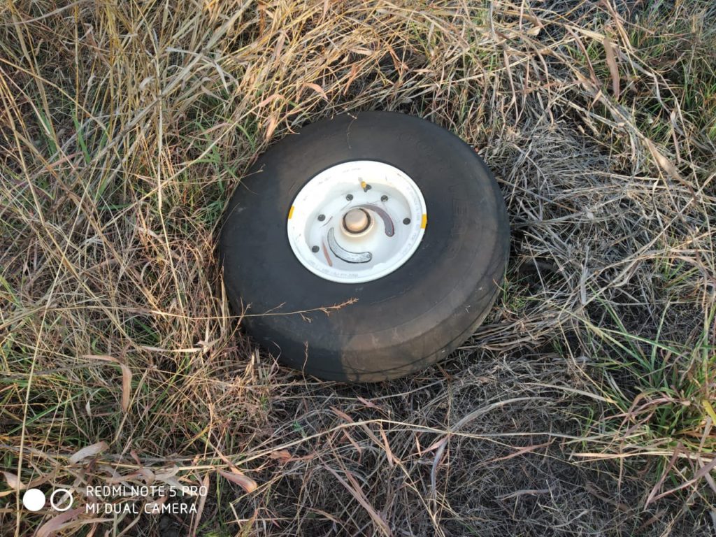 a tire in the grass
