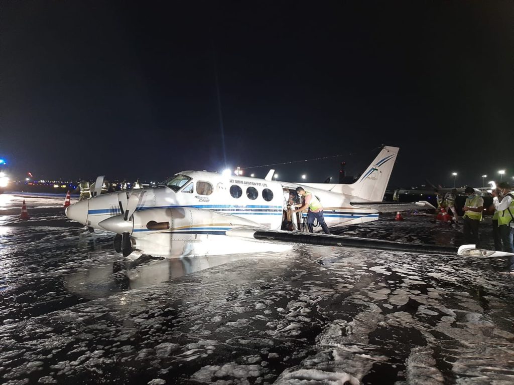 a plane on ice at night