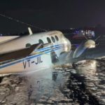 a plane in water at night