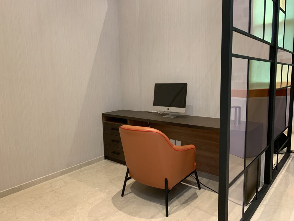 a chair and desk in a room