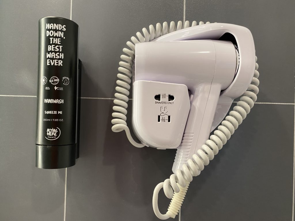 a hair dryer and a tube