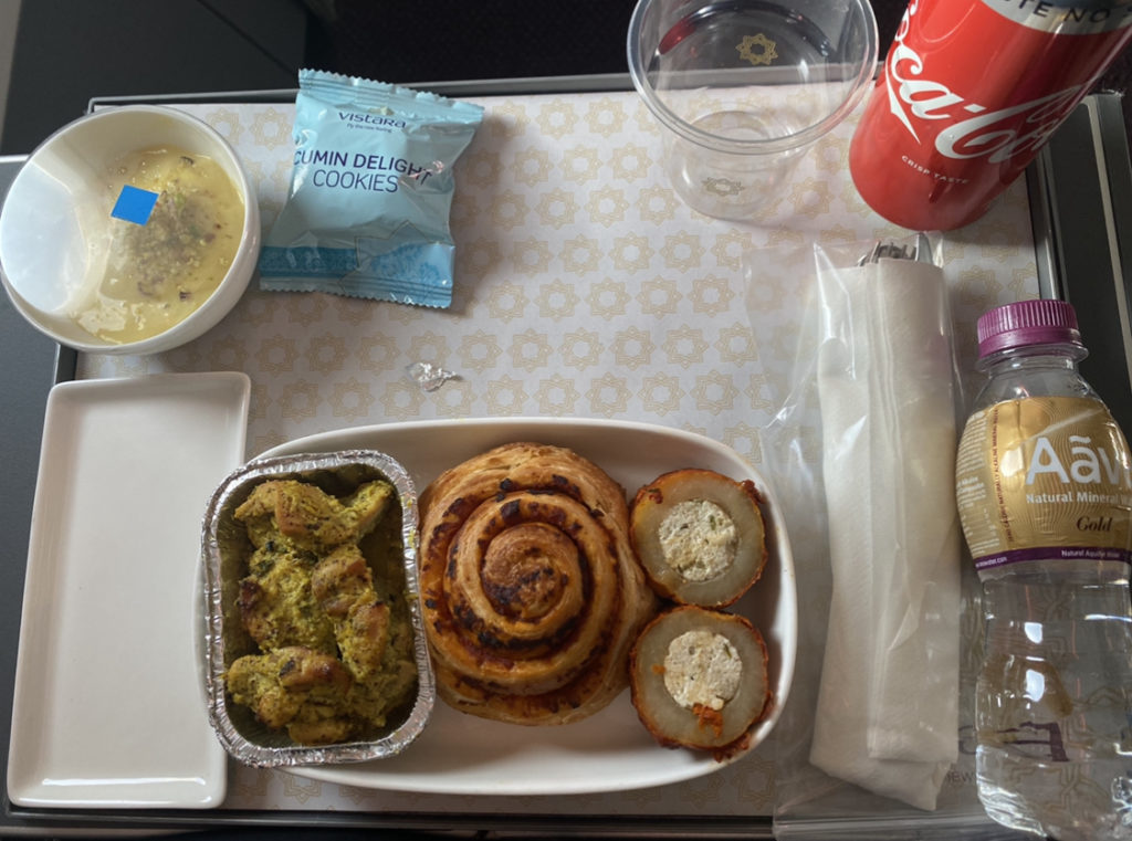 food on a tray with food and drinks
