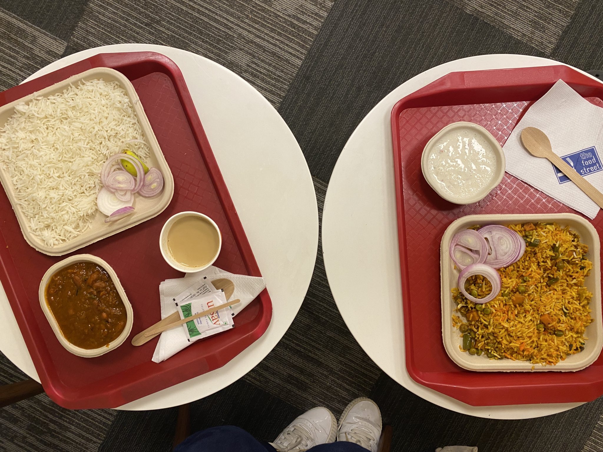 two trays of food on a table