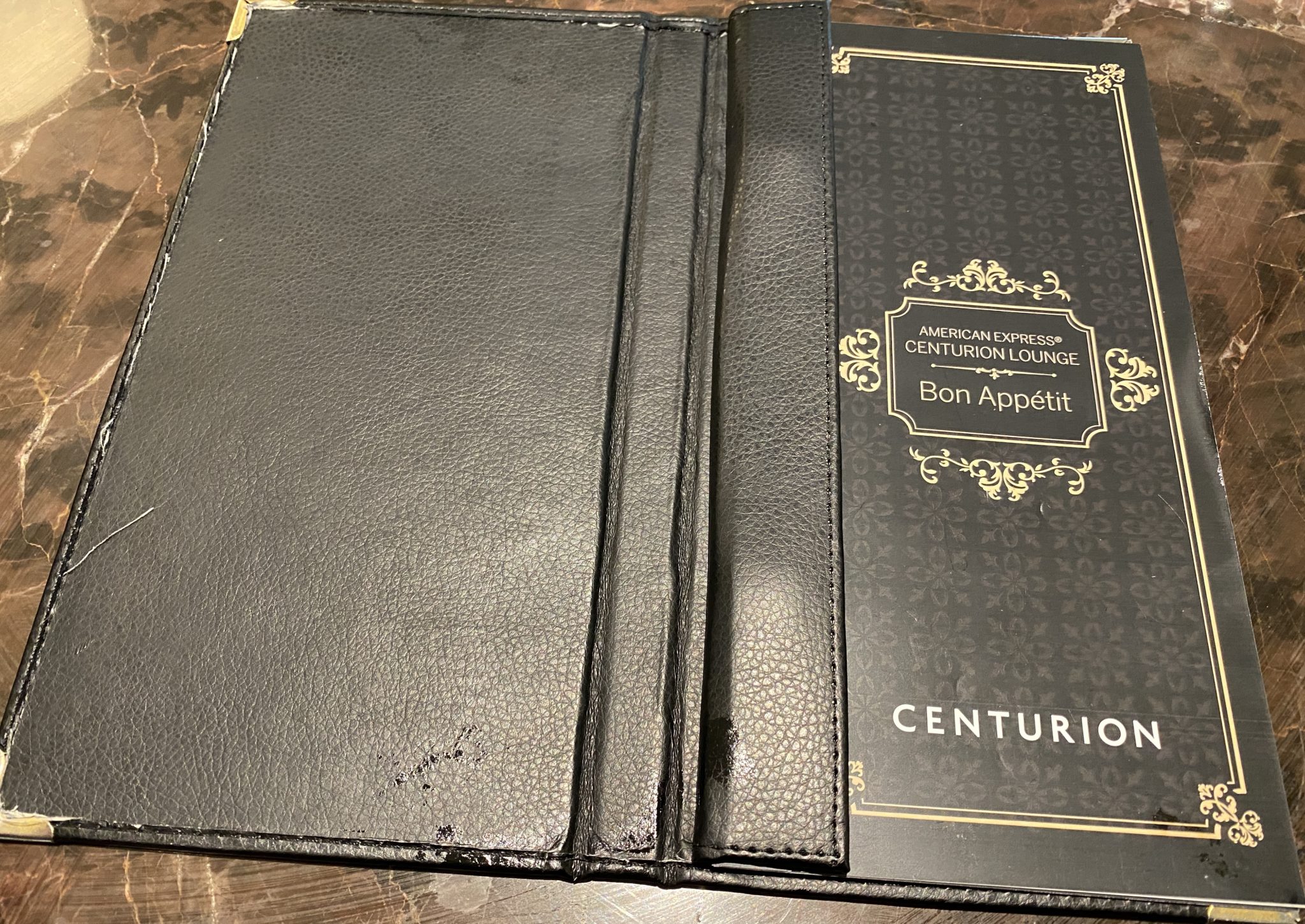 a black leather menu cover