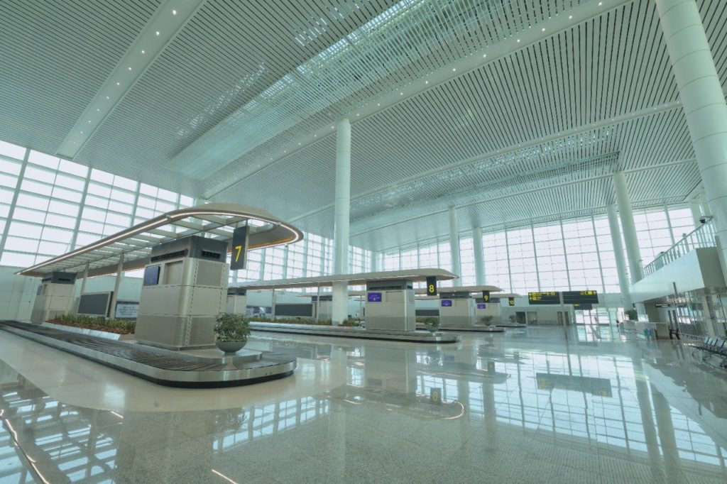 an airport with luggage carousels