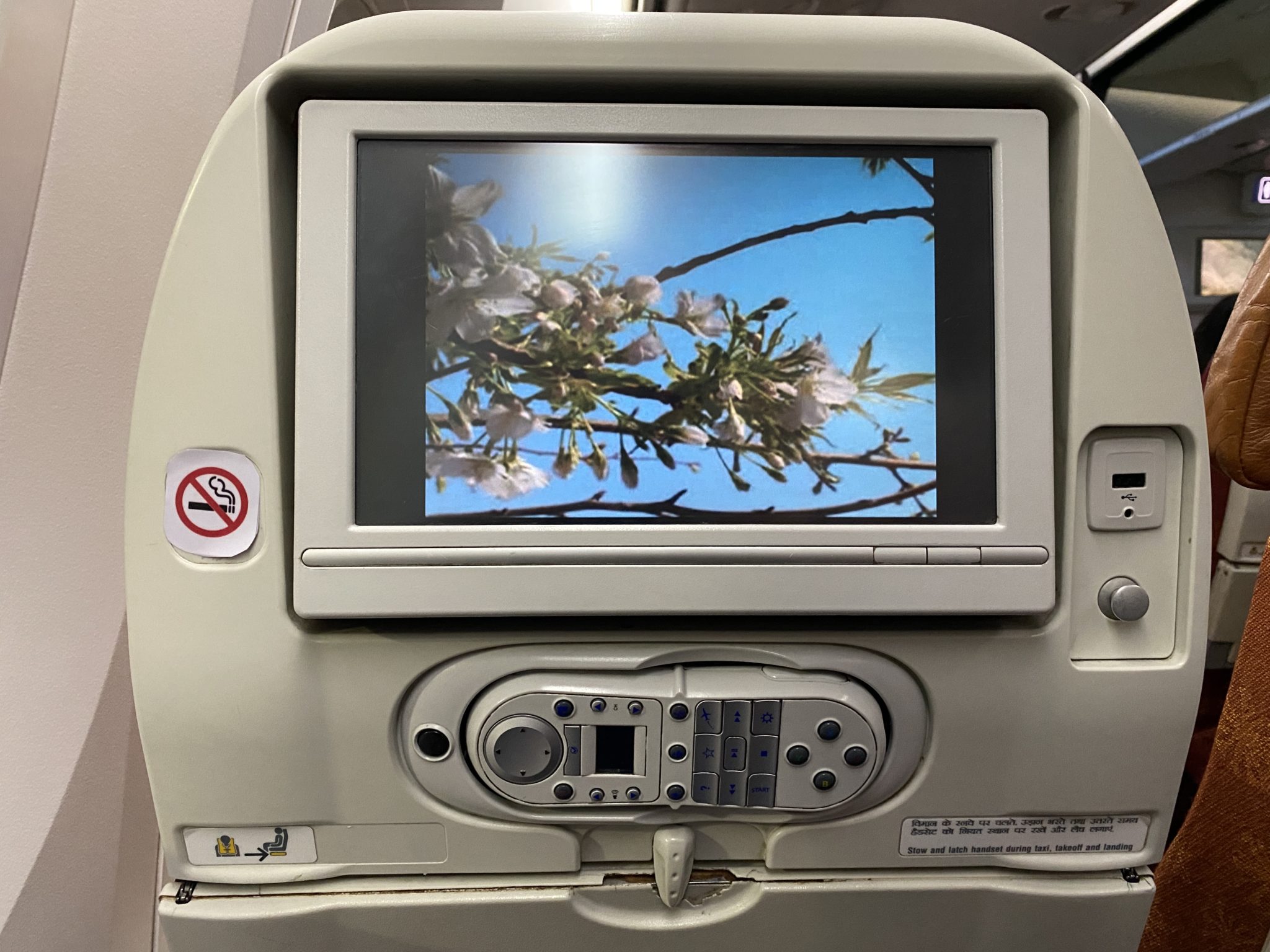 a screen on an airplane