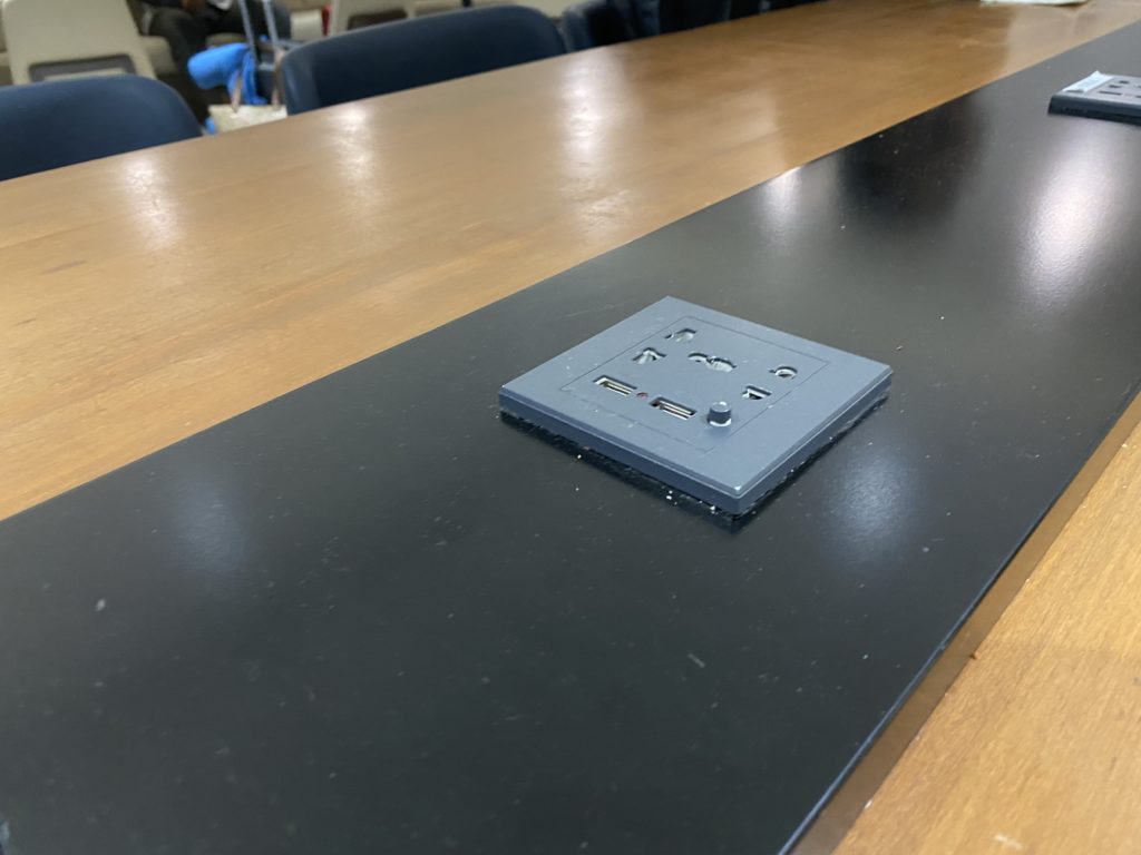 a rectangular electrical outlet on a table