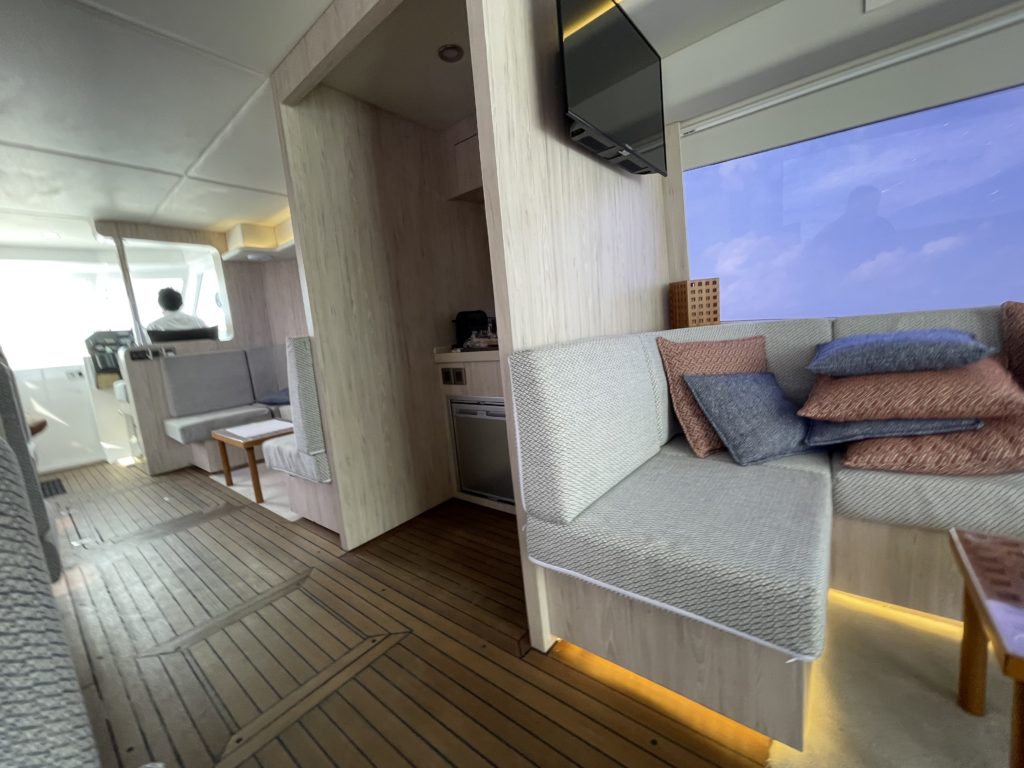 a couches and a tv on a boat