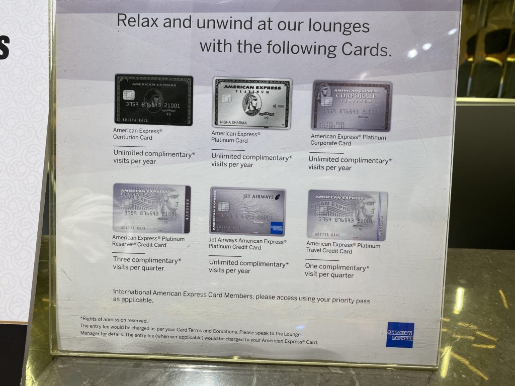 a sign with credit cards