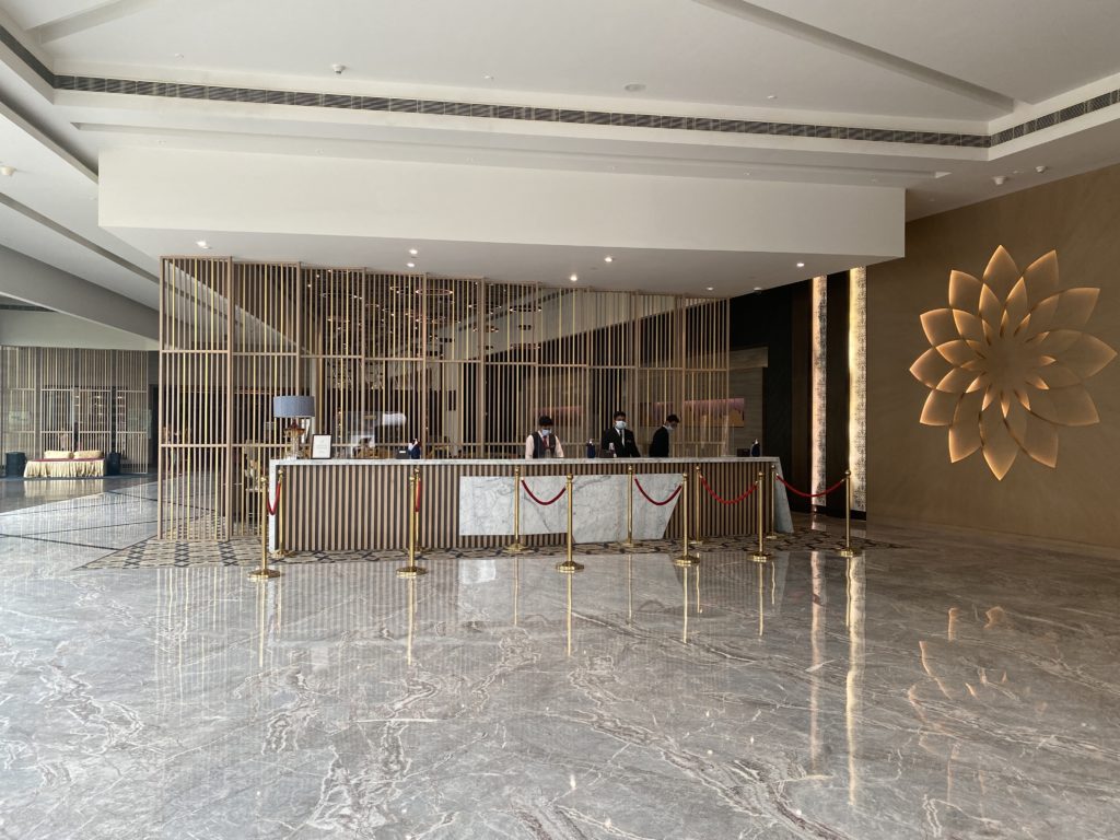 a lobby with a marble floor and a marble floor