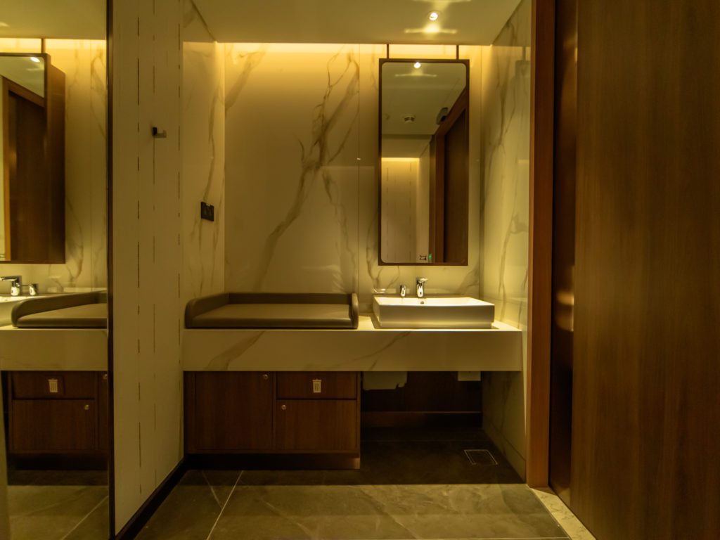 a bathroom with a sink and mirror