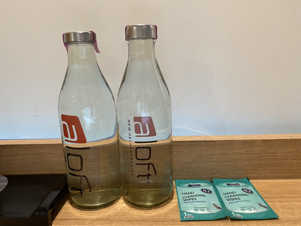 two bottles of liquid next to each other