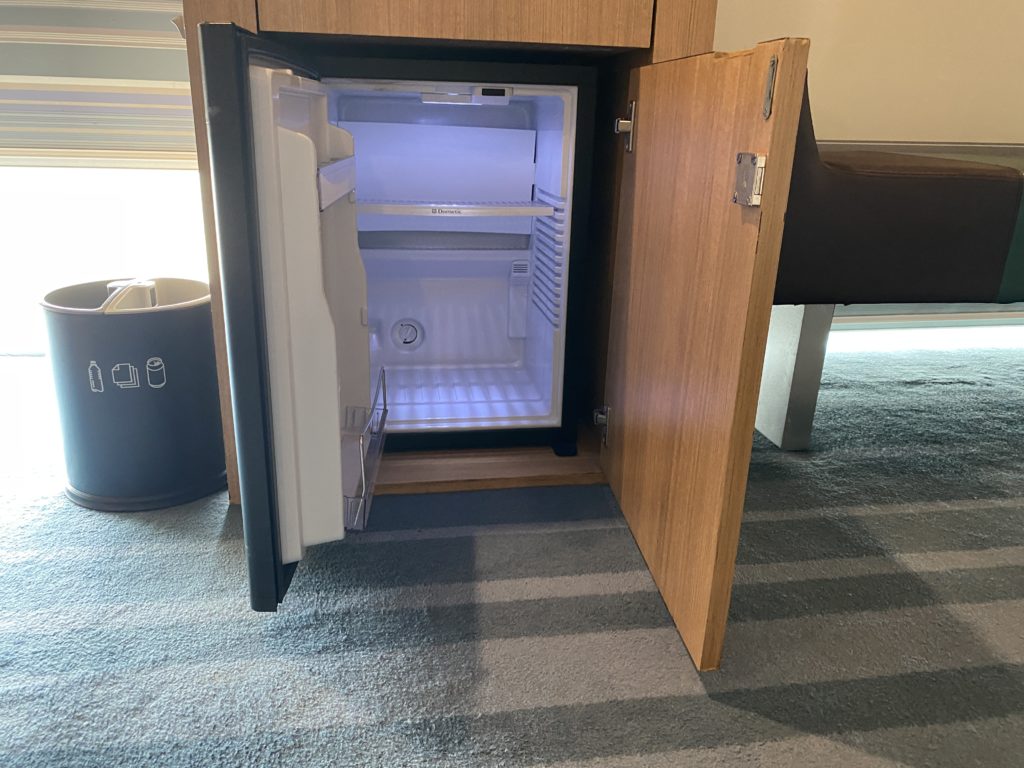 a small refrigerator in a room