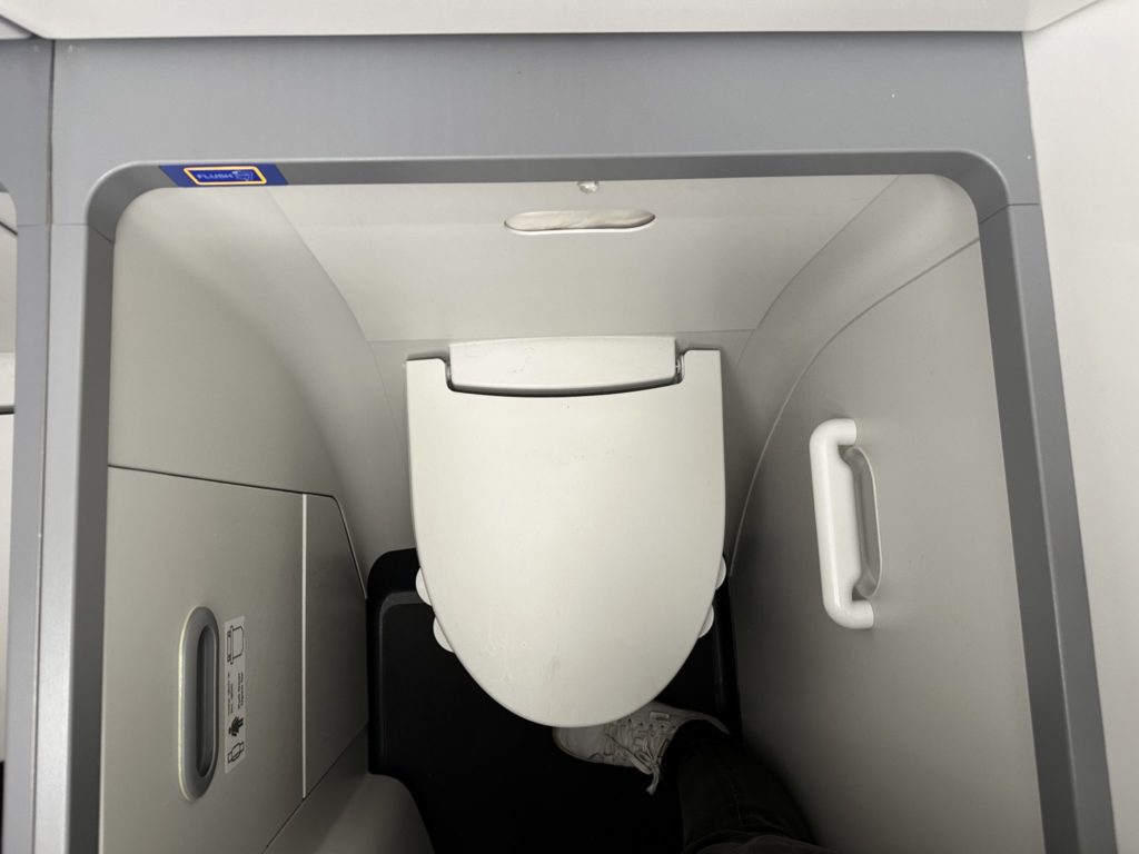 a toilet in an airplane