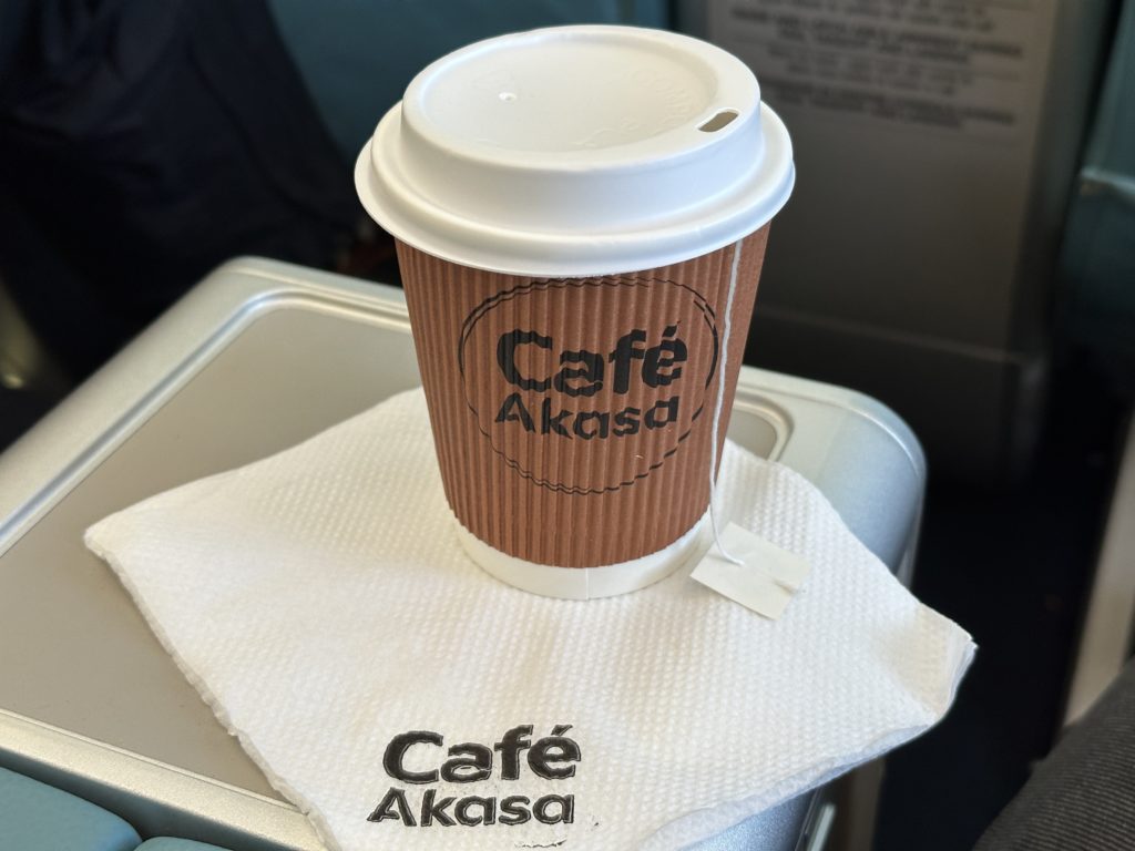 a coffee cup on a napkin