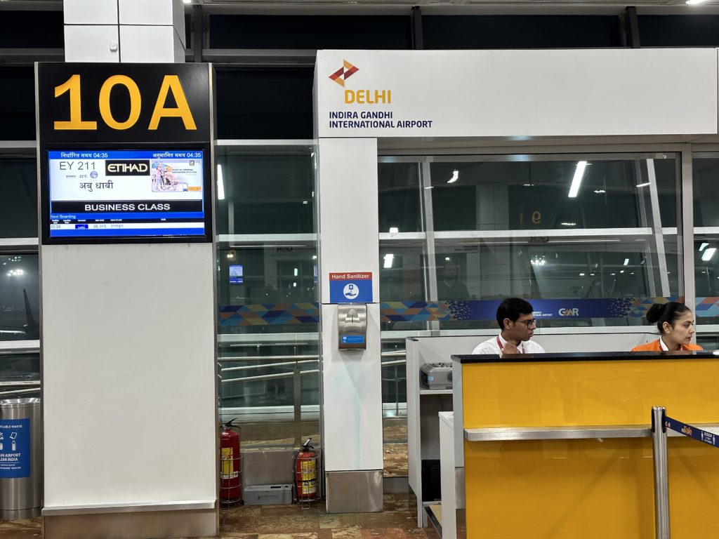 a man at a counter in an airport