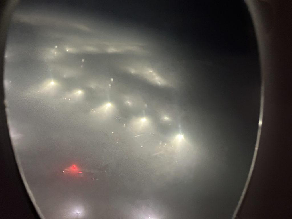 a view of lights from an airplane window