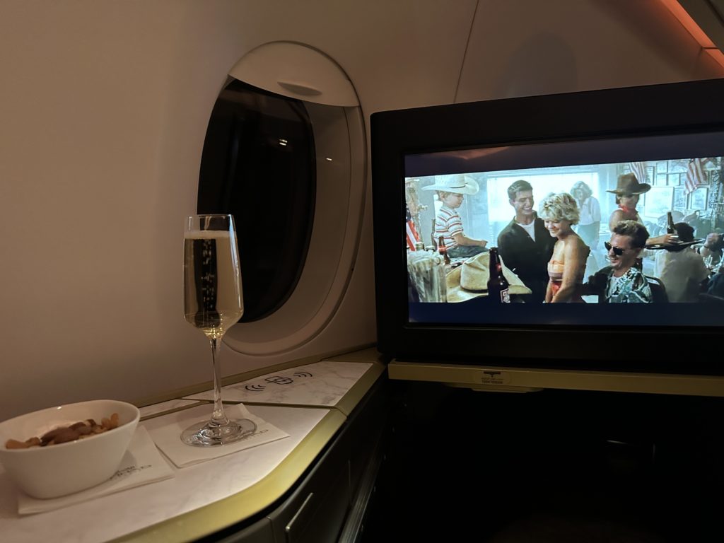 a tv on a table in an airplane