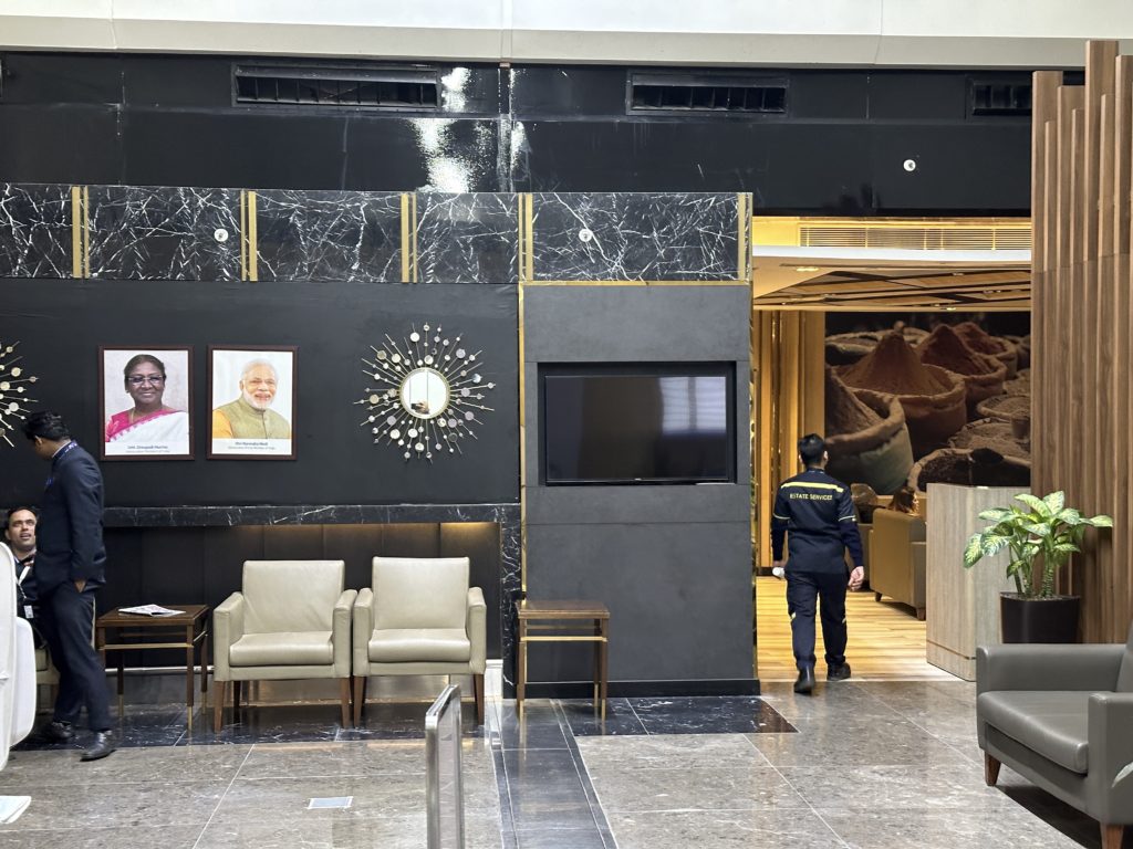 a man walking in a lobby