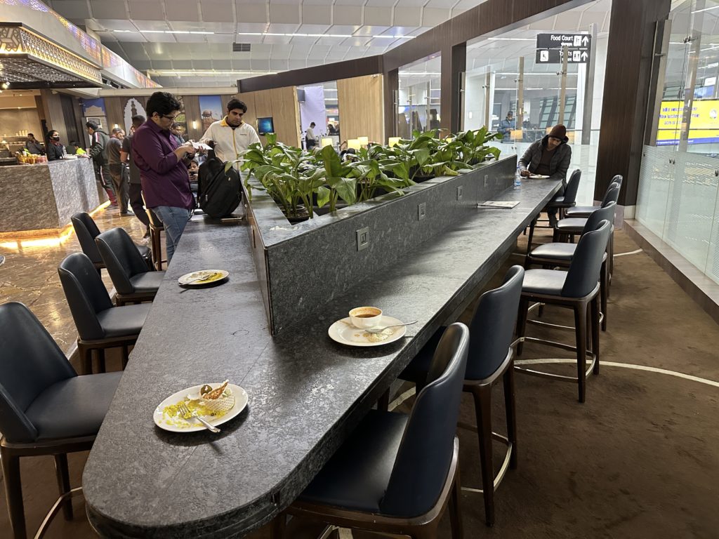 a long table with plants on it