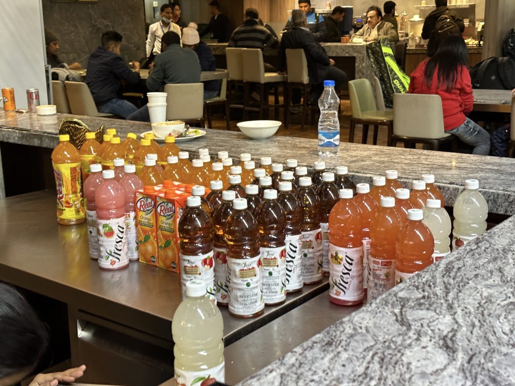 a group of bottles of drinks on a table
