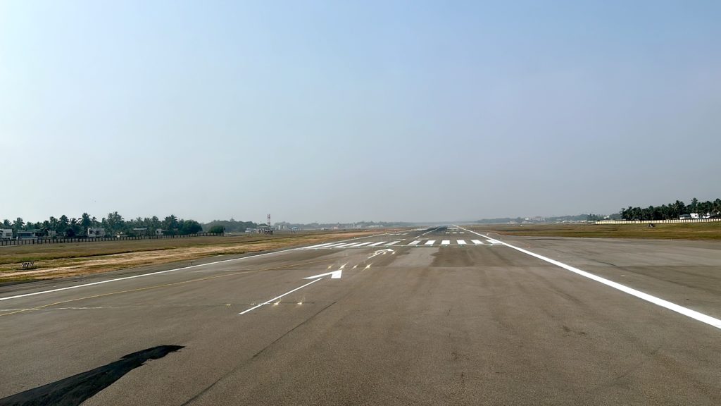 a runway with a plane on it