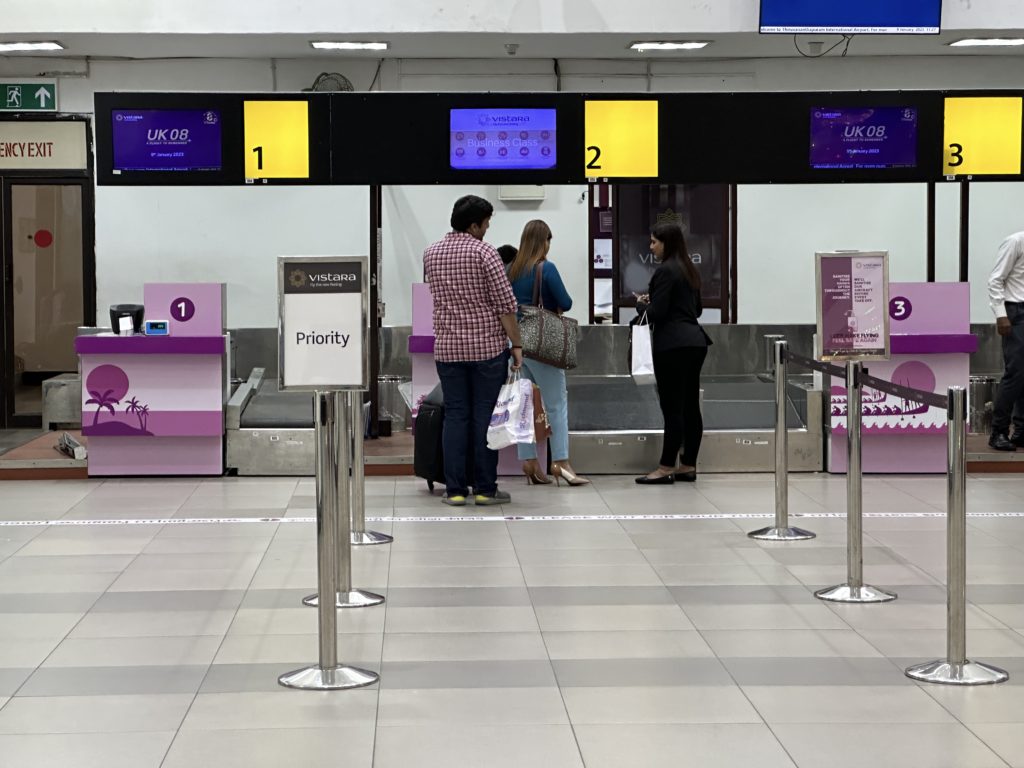 people standing in front of a counter