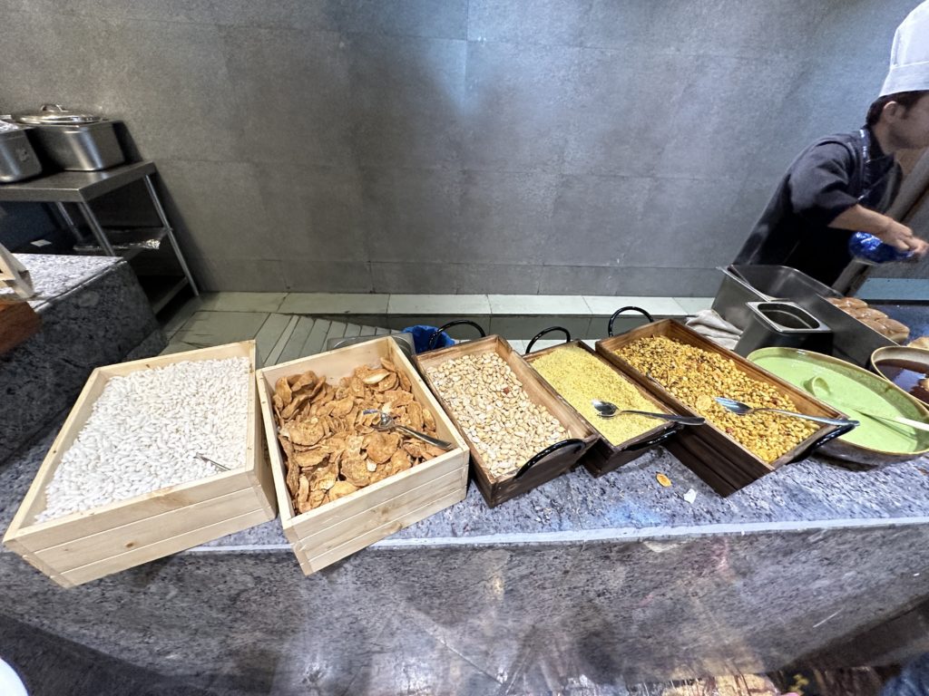 a group of wooden boxes with cereals and cereals