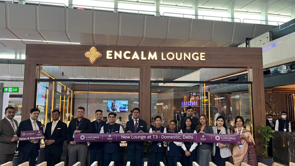 a group of people standing in front of a sign