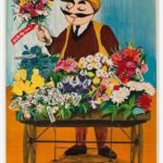 a man holding flowers in a cart