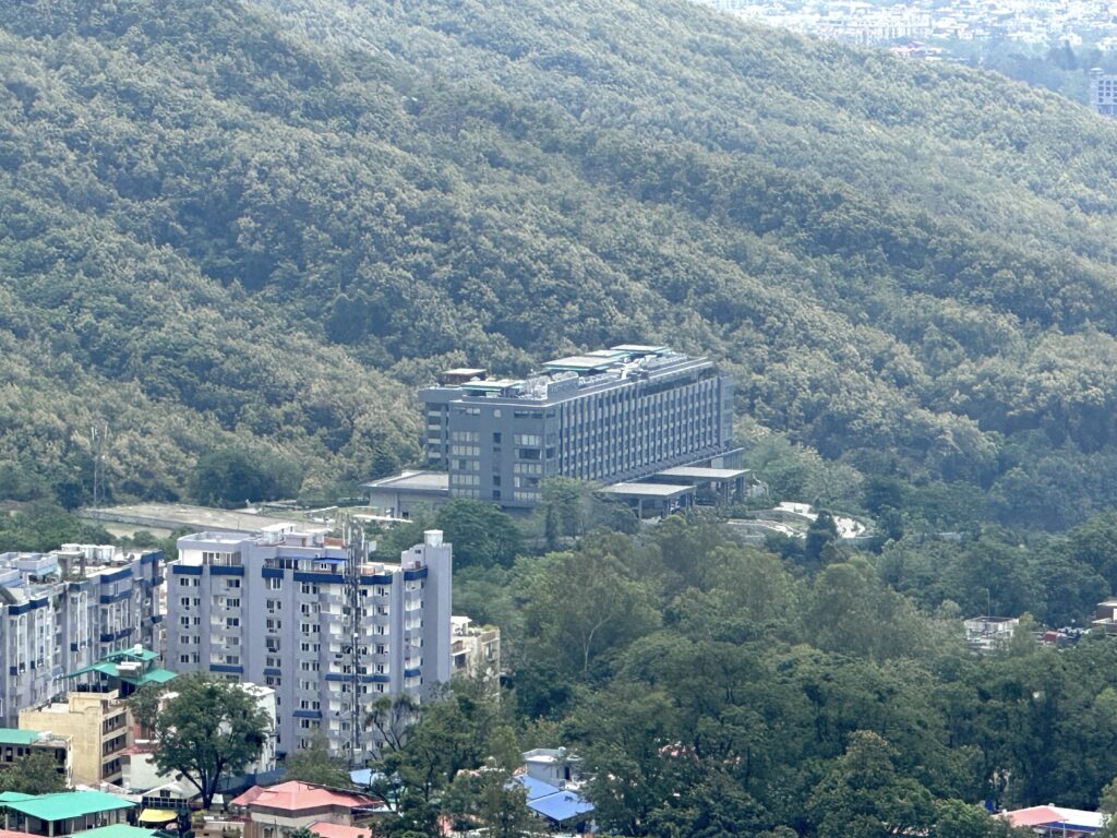 a building in the middle of a forest