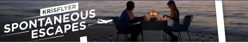 a man sitting at a table with a laptop