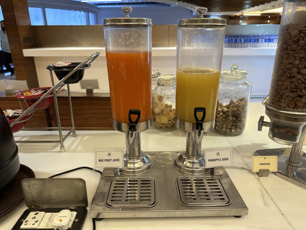 a juice dispenser on a table