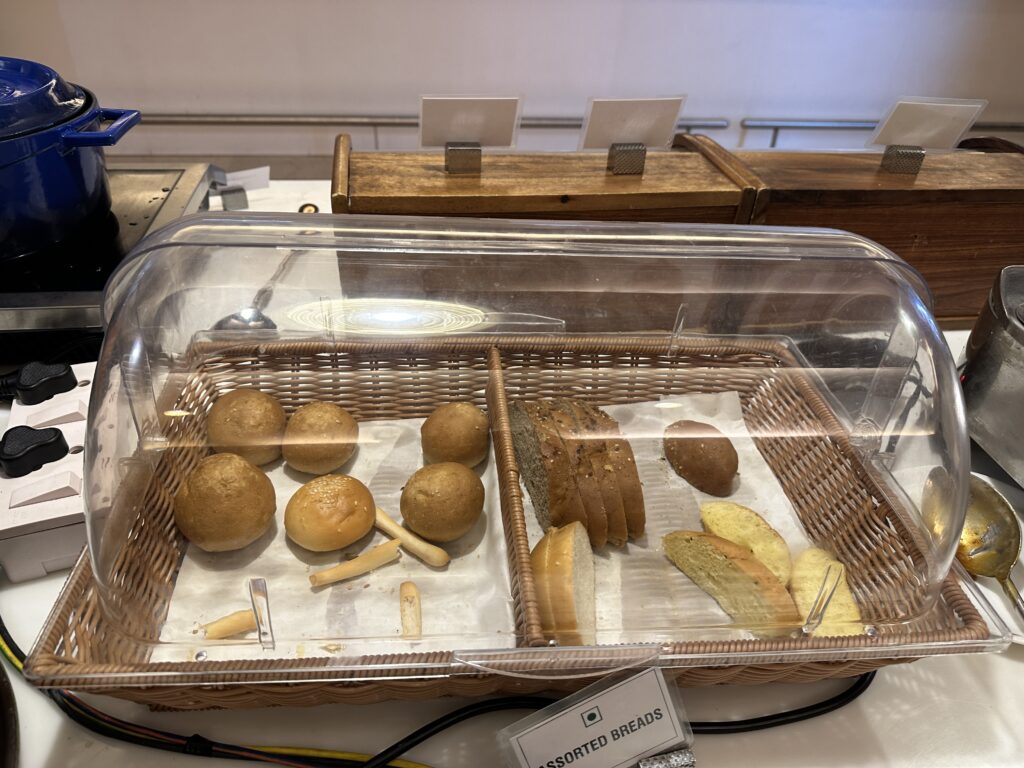a basket of bread in a glass container